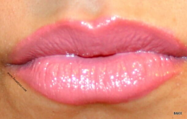 Gloss applied on a lipstick